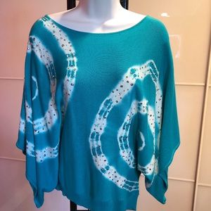 teal blue and white sweater